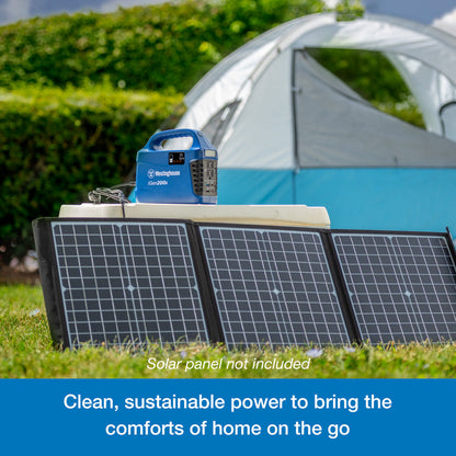 Westinghouse | iGen200s Portable Power Station sits atop a cooler. Leaning against the cooler are three solar panels that are plugged into the power station. A blue banner at the bottom reads, "Clean, sustainable power station that powers the comforts of home on the go".