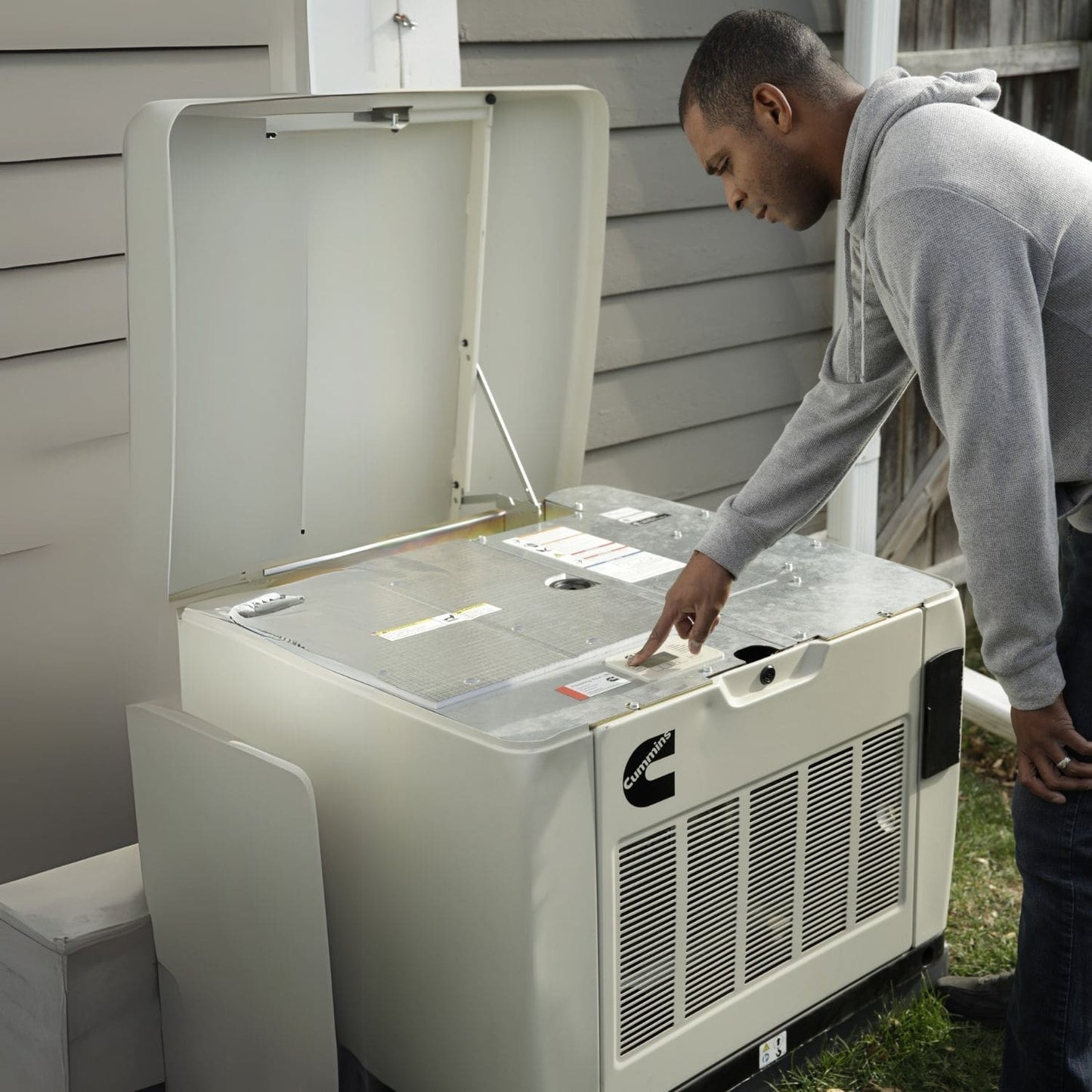 Cummins RS13A 13kW Home Standby Generator man setting this up