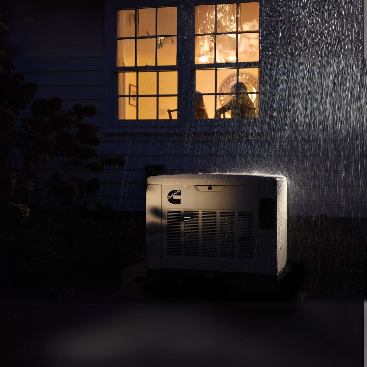 Cummins RS17A 17kW Home Standby Generator installed outside at night
