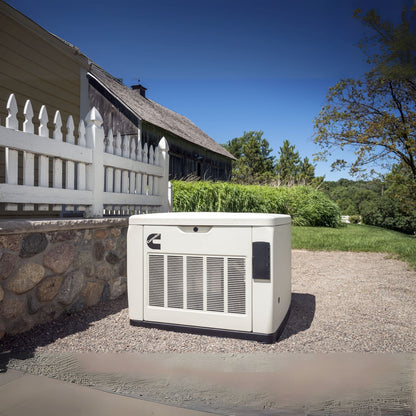 Cummins RS20A 20kW Home Standby Generator installed beside the fence